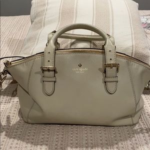 Kate Spade satchel puede in off white.